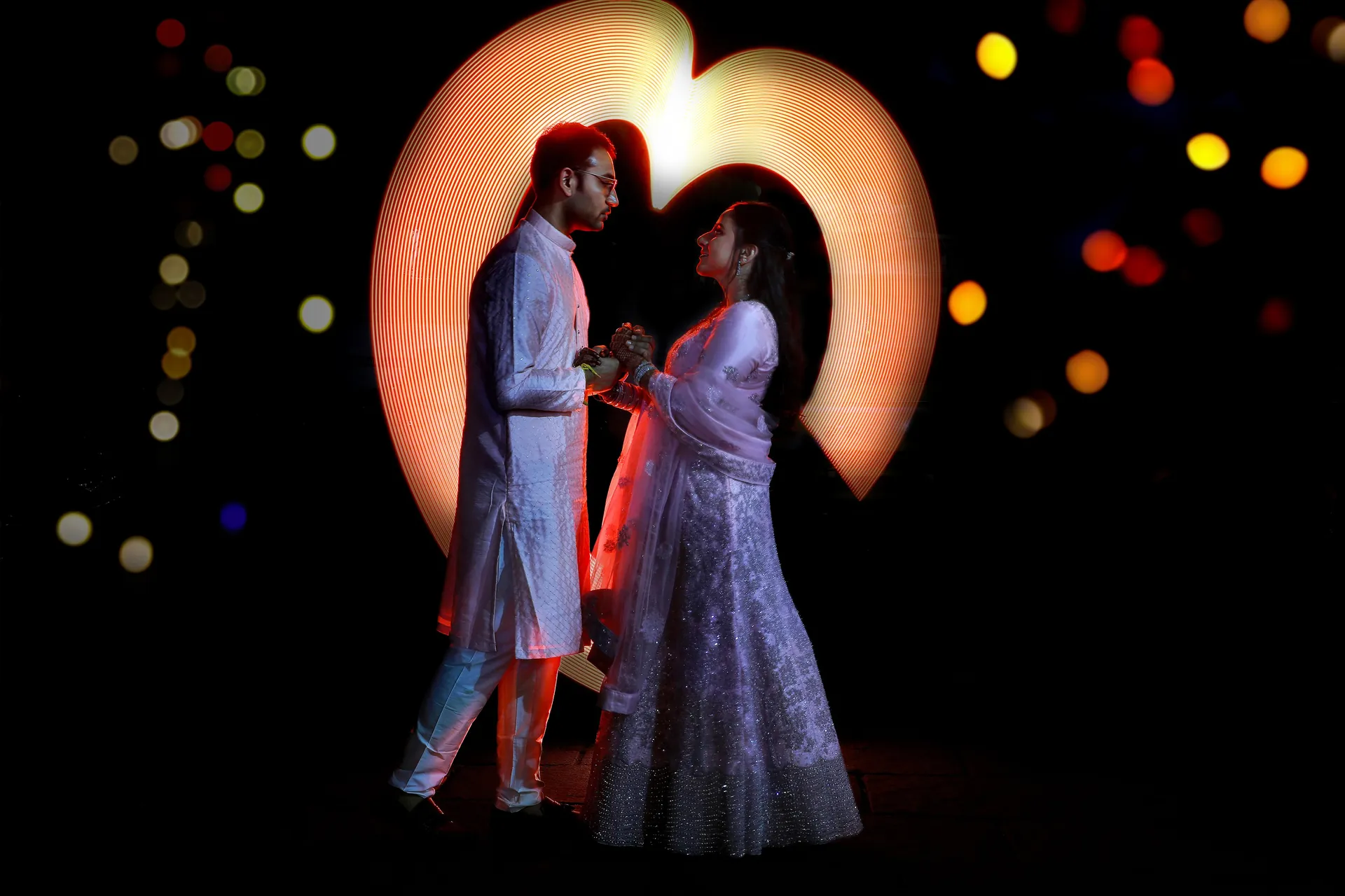 Bride and groom sharing an intimate moment, photographed by Vizhithirai Clicks